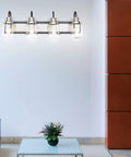 Modern Black And Satin Nickel Vanity Light With Clear Glass Shades, 4-Bulb Indoor Wall Lamp For Farmhouse Bathrooms displayed on white wall