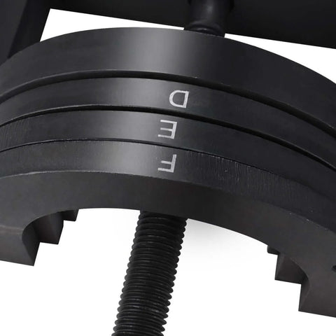 Close-up of the Ultimate Wheel Hub Removal Tool Set with C to U sizes, showing labeled metal rings D, E, F for DIY car maintenance.