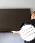 Heavy Duty TV Wall Mount Anchor Kit With Drywall Screws And Concrete Expansion Tubes For Easy Install In Drywall Brick Or Concrete Walls Heavy Duty Steel Mounting Hardware For Secure TV Mounting On Studs Or Solid Masonry. Installer mounting a flat-screen TV with steel anchors