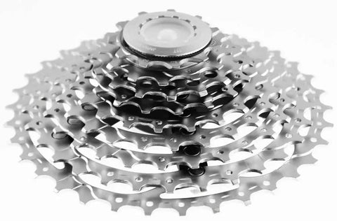 XT 9 Speed Bicycle Cassette 11 To 34T Silver with Lightweight Aluminum Carrier for Mountain Bikes shown top view