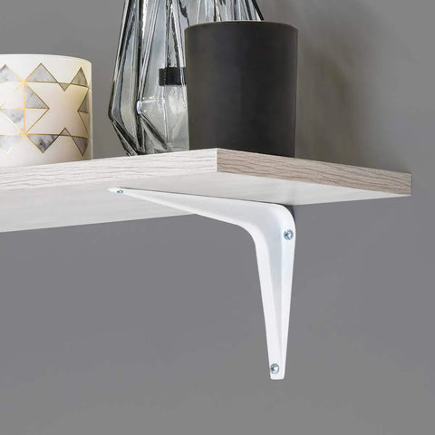 Close-up of white powder coated shelf bracket 10 inch by 12 inch holding a wooden shelf in living room