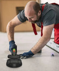 Worker using Handheld Tile Vibration Leveling Tool With 6 Speed Adjustable Settings One Touch Start LCD Display And Power