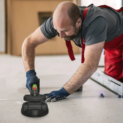 Worker using Handheld Tile Vibration Leveling Tool With 6 Speed Adjustable Settings One Touch Start LCD Display And Power