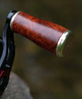 Upgrade Your Gear With This Premium Burl Rosewood Fishing Reel Handle Knob Replacement, Featuring An Ergonomic Lightweight Design Perfect For Long Days At The Lake And Smoother Casting Action. close-up burl rosewood fishing reel handle knob replacement, 16.8 mm, 3.88 cm
