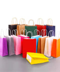 Colorful Handle Kraft Paper Bags with Sturdy Handles for Shopping Gift Party and Wedding Packaging Durable Reusable Black Kraft Bags 21x14x27 Cm 50 or 100 Pack Now displayed in a variety of colors.