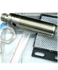 Ultrasonic Sensor With IO Link, Wide 90 To 2000 Mm Detection Range, Non Contact Proximity Sensing For Industrial Automation, Heavy Duty Proximity Detector For Factory Floor, Robotics And Process Lines shown in threaded metal housing