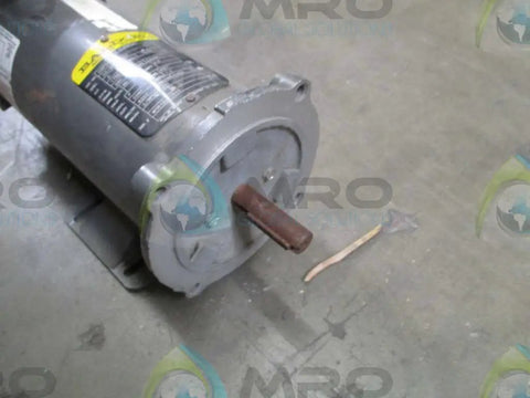 56C Frame TENV DC Motor 0.5 HP 1750 RPM 90V Armature Voltage 3336P F1 in side view on concrete floor