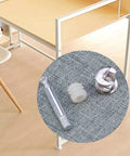 Heavy Duty Furniture Cam Lock Set With 24 Cam Bolts Nuts And Dowels on fabric with assembled table in background