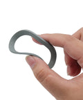 Hand holding flexible 2 Pack Blender O Ring Gasket Seals For Oster And Osterizer Models, Durable Rubber Replacement Seals, grey rubber gasket