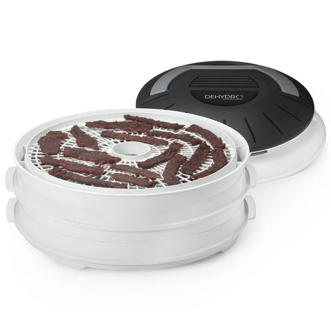 Electric Food Dehydrator With Four Stackable Trays And Top Mounted Fan, showing beef jerky on mesh tray.