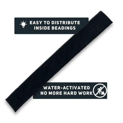 Black strip of water activated flood barriers for doors and entrances, sandless flood bags for quick rain protection, 1 ft by 2 ft