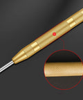 Slick Badass Automatic Center Punch For Metal And Woodworking With Precise Spring Loaded Marking Tool Game Changer For Diy Workshop Projects No Sweat Positioning Handheld Steel Gold Finish with textured grip and metal tip.