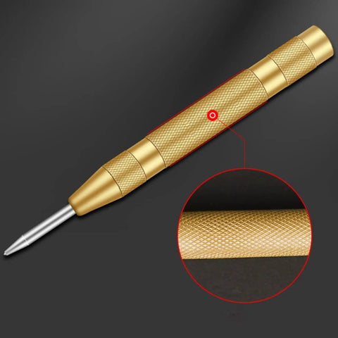 Slick Badass Automatic Center Punch For Metal And Woodworking With Precise Spring Loaded Marking Tool Game Changer For Diy Workshop Projects No Sweat Positioning Handheld Steel Gold Finish with textured grip and metal tip.