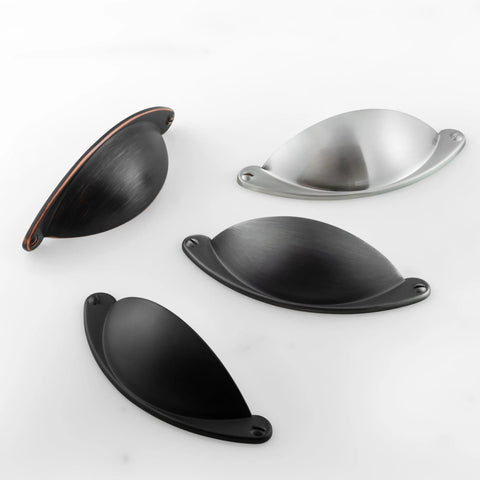 Various styles of 2.5 inch cup pulls, including oil rubbed bronze drawer pulls, shown in different finishes and angles.