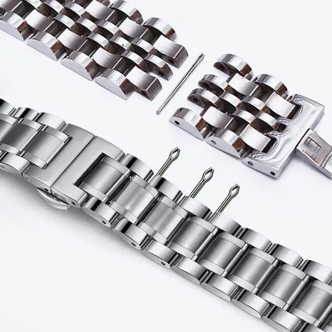 Close-up of Stainless Steel Watch Band Spring Bars And Link Pins Kit 360 Pcs Assortment For 6 To 23mm Straps, showing metal pins and links.
