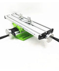 Heavy Duty Mini Metal Lathe Machine Cross Slide Table With Multistage Adjustment Vise Fixture for precise milling in green and silver.