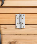 Stainless Steel Spring Loaded Self Closing Hidden Door Hinge on wood background with tools, Built Tough 4 Pack Concealed Door Closers