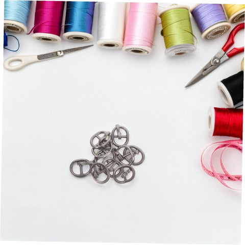 150 Pcs Miniature Alloy Buckles For Doll Clothes Shoes Belts Quick Release Metal Fasteners on sewing background
