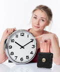 Person holding a wall clock and Quartz Clock Movement Replacement For DIY Projects With Quiet Sweep Technology Silent Battery Operated