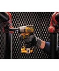Person using 12V Max Cordless Three Eighths Inch Impact Wrench Tool Only With Brushless Motor on pipe fitting