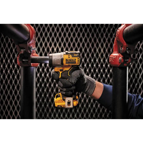 Person using 12V Max Cordless Three Eighths Inch Impact Wrench Tool Only With Brushless Motor on pipe fitting