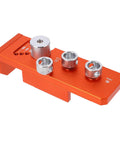 Integrated Aluminum Profile Drill Jig For Automated Assembly Lines, orange anodized finish, viewed from top angle.