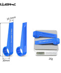 Bike Disc Brake Pad Spreader And Piston Reset Tool for Hydraulic Calipers, single-sided reset, blue, on digital scale showing 26g