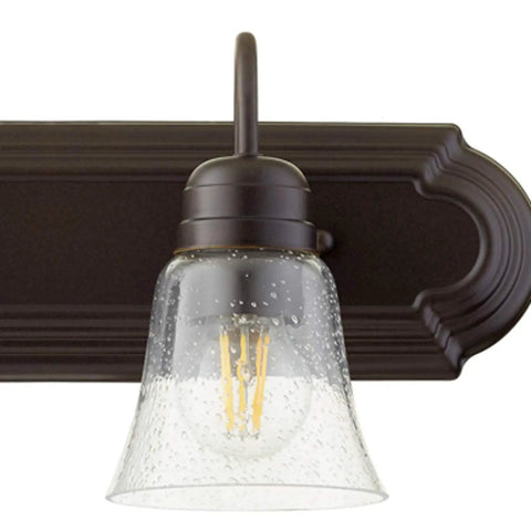 Transitional Five Light Vanity Fixture in Oiled Bronze with Clear and Seeded Glass Damp Rated Bathroom Lighting close-up