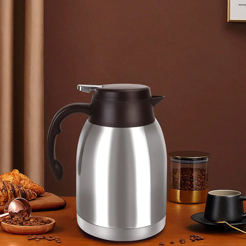 54oz Stainless Steel Thermal Coffee Carafe Dispenser No Spill With Unbreakable Double Wall Vacuum Insulation on table