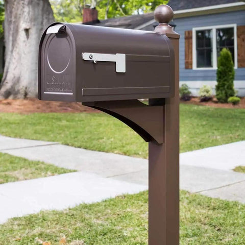 Northpointe Large Capacity Post Mount Mailbox In Galvanized Steel With Venetian Bronze Finish outside a home