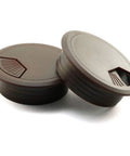 Super Slick Two Inch Desk Cable Grommet Covers in dark brown ABS plastic, designed to organize and hide cords in workstations.
