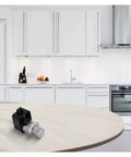 Push Button Cabinet Lock Latch Easy DIY Install Spring Pop Button Release Durable ABS Base Corrosion Resistant Plastic shown in kitchen