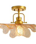Modern Brass Ceiling Pendant Light With Green Glass Flower Shade Gold Ceiling Lamp For Bedroom Living Room Dining Room And Hallway E26 110V Semi Flush Mount Chic Boss Home Lighting That's Straight Up Lit, featuring a brass base and flower-shaped glass shade.