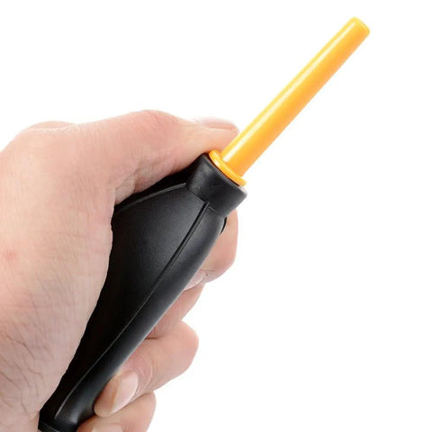 Person holding Dope Dust Blower And Air Cleaner For DSLR Cameras Camcorders And Lenses With Microfiber Cloth, orange nozzle.