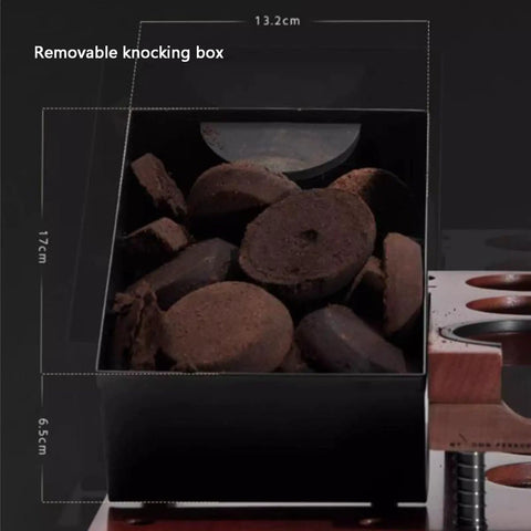 Removable knocking box filled with used coffee grounds, part of Solid Walnut Coffee Tamping Station And Espresso Knock Box Featuring Double Layer Accessory Storage Fits 51 54 58mm Portafilters To Tame Your Daily Grind.