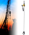 Mini Chain Hoist With G80 Chain next to construction crane at sunset