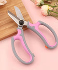 Pink Flower Shears For Easy Pruning And Plant Care No Fuss Garden Tool With Safety Handle Lightweight Trimming Scissors For Gardening And Home Maintenance Boss Level Cut For Flowers And Branches, pink stainless steel blades on pastel background