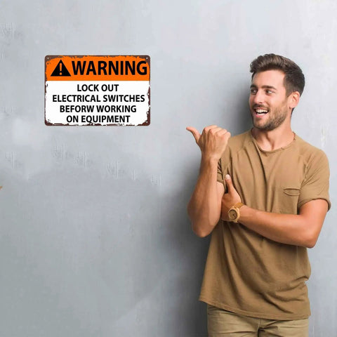 Man pointing at Lockout Electrical Switches Before Working On Equipment Sign Aluminum 8x12 Inch Wall Decor for workshop.