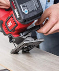 Hands using Beast Mode Cordless Jigsaw Kit With Brushless 20V Power Core 20 Battery 2.0Ah on wood surface, precise cutting.