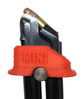 Close-up of Mini Mag Speed Loader Fits Ruger Mark I II III IV 22 45, Smith And Wesson Victory, Browning Buck Mark 22LR with red ergonomic design