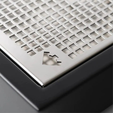 Close-up of drip tray on Bello+ Espresso Machine And Eureka Mignon Specialita Grinder Bundle In White With PID Temperature Control.