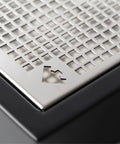 Solid Dual Boiler Espresso Bundle Paired With Adjustable Ceramic Burr Grinder Made For Serious Home Baristas featuring a close-up of the stainless steel drip tray.