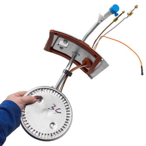 Person holding Model Specific Water Heater Burner Assembly Replacement For Your Unit Not Universal Exact Fit Burner Kit Replaces AM44969