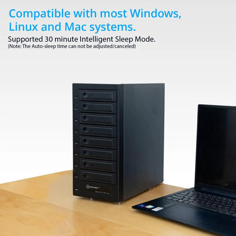 Rock Solid Eight Bay Thunderbolt 4 Usb4 Enclosure for two and three inch drives next to a laptop on a table.