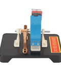 Close-up of Super Chill DIY DC Electric Motor Model Kit showing copper wires and blue frame on black base.