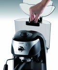 Pro Grade 15 Bar Pump Driven Espresso Maker With Stainless Steel Boiler And Swivel Jet Frother For Creamy Drinks Plus Built In Tamper And Quick Fill Reservoir For Badass Home Baristas, showing water tank being refilled.