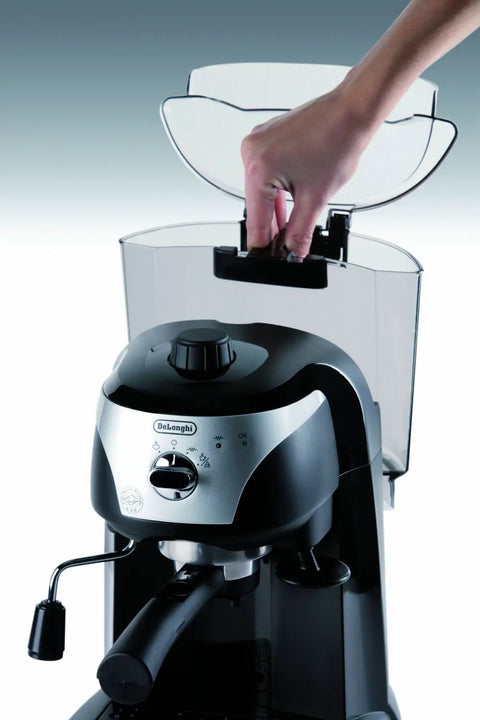 Pro Grade 15 Bar Pump Driven Espresso Maker With Stainless Steel Boiler And Swivel Jet Frother For Creamy Drinks Plus Built In Tamper And Quick Fill Reservoir For Badass Home Baristas, showing water tank being refilled.