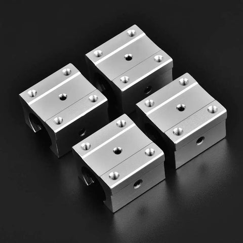 SBR16UU 16mm Aluminum Linear Ball Bearing Slide Block With Chrome Plated Rod For Cnc Machines And Diy Builds Hella Smooth Ride Rock Solid Crafted For Zero Lag Performance, four aluminum sliders on black background.