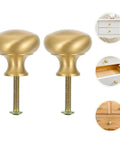 Slick Brushed Matte Brass Cabinet Handle And Drawer Pull Knob 2.8 Cm Single Hole Mid Size Furniture Pulls For Kitchen Cupboards And Wardrobes Durable Modern Hardware 2 Pack shown in close-up angle with drawer examples