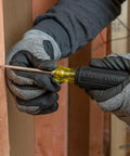 Worker using 650 Scratch Awl With A 3 And A Half Inch Shank And Cushion Grip For Precise Scribing, Hole Starting, Punching And Metalwork.